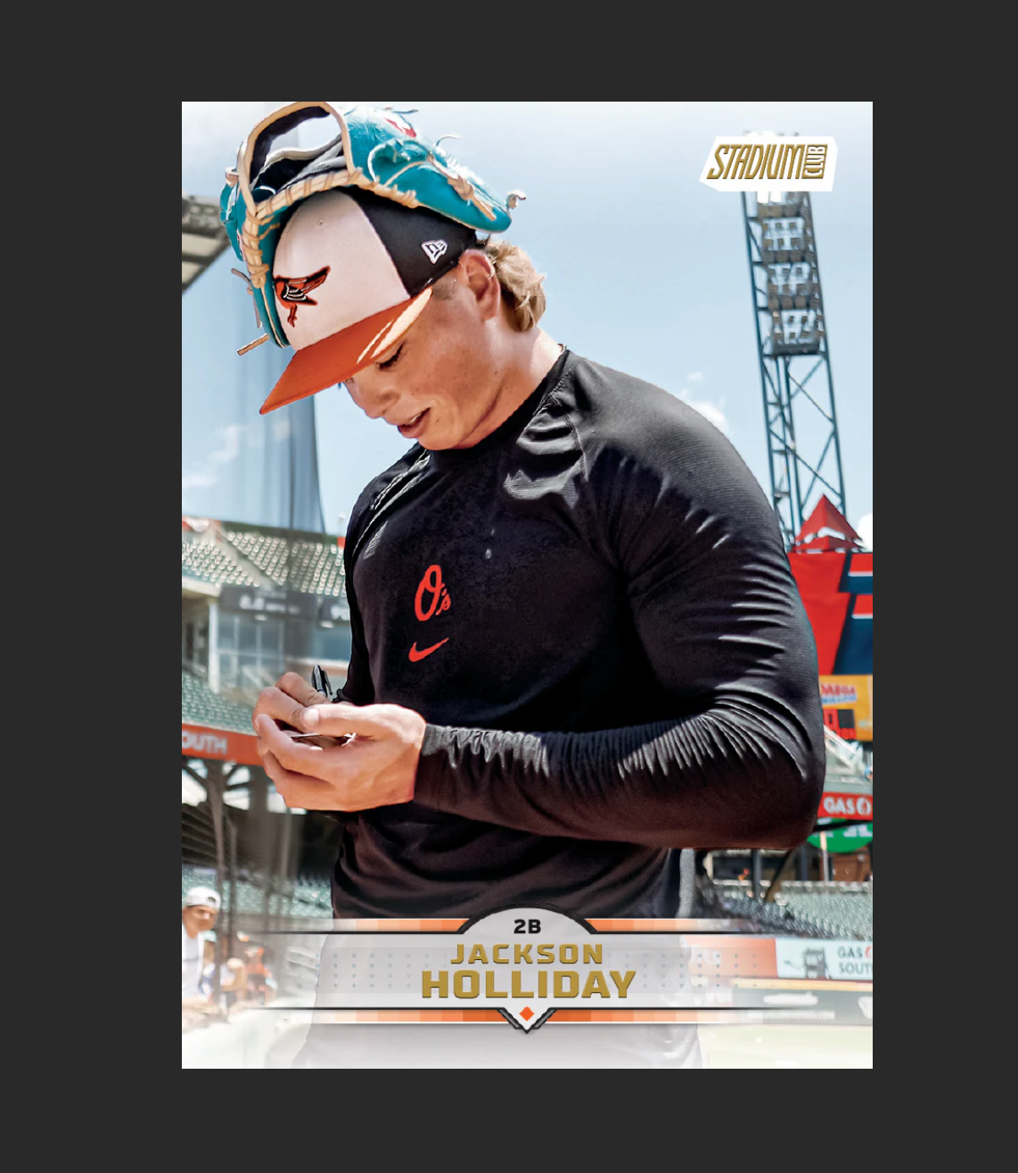 Baseball player in a stadium setting with a sports trading card design overlay.