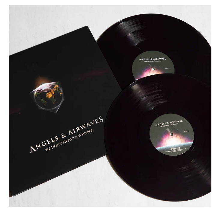 Vinyl records with 'Angels & Airwaves' cover and disc on a white background
