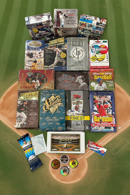 Collection of baseball card boxes with sunflower seeds, bubble gum, penny sleeves and Arthur's Roundup Box and logo stickers
