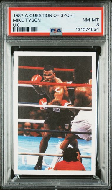 Boxing card of Mike Tyson in a boxing ring with a PSA grading label on top.