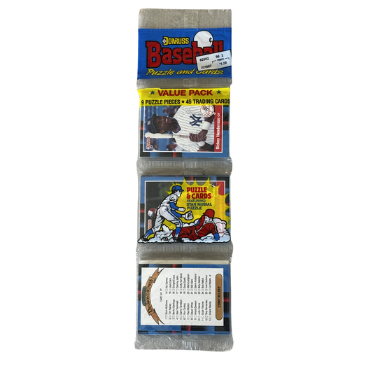 Baseball trading card pack with puzzles and cards on a white background
