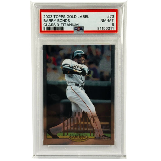 A graded 2002 Topps Gold Label baseball card of Barry Bonds, sealed in a clear PSA slab. The card is numbered #73 and graded NM-MT Class 3 Titanium.