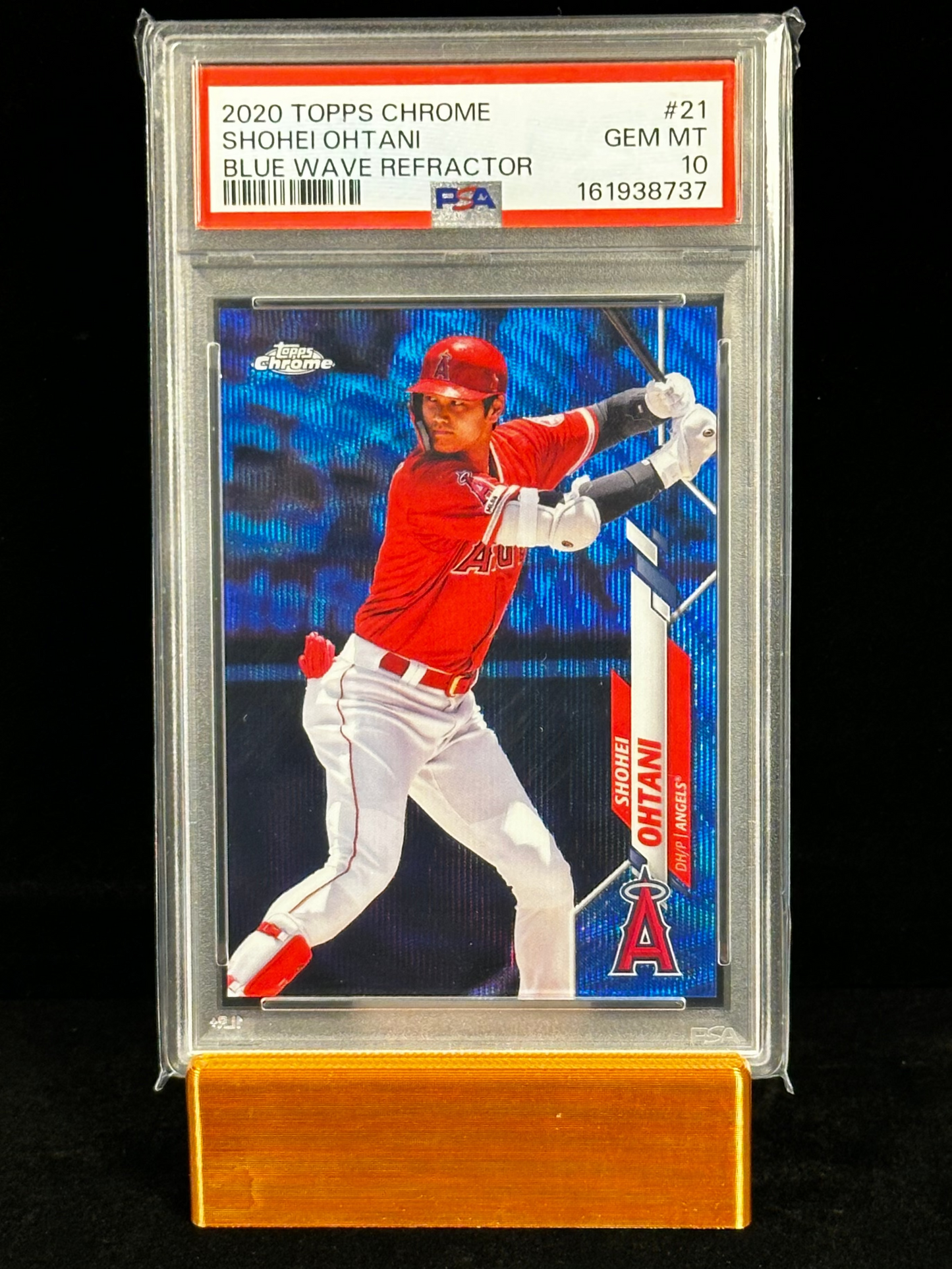 A graded 2020 Topps Chrome baseball card of Shomei Ohtani, encapsulated in a PSA/GMTC Mint 10 holder and displayed on a wooden stand against a black background.