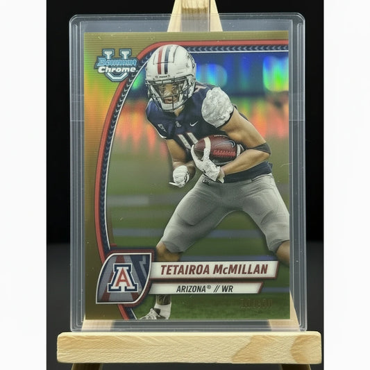 Football trading card of Tetairoa McMillan on a display stand