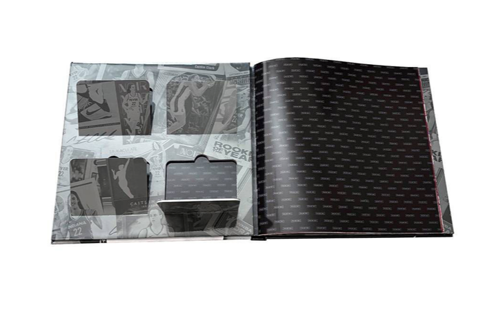 Carbon fiber patterned book with a clear plastic cover on a white background
