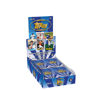 Topps trading card packs displayed in a box on a dark background