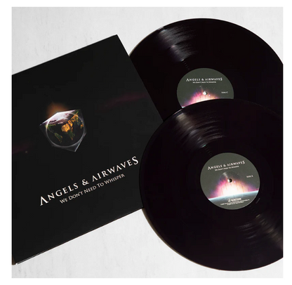 Vinyl records with 'Angels & Airwaves' cover and disc on a white background