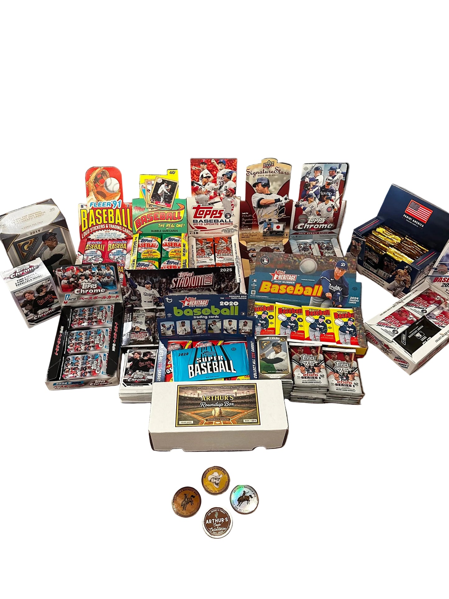 Collection of baseball trading cards and packaging on a wooden table.