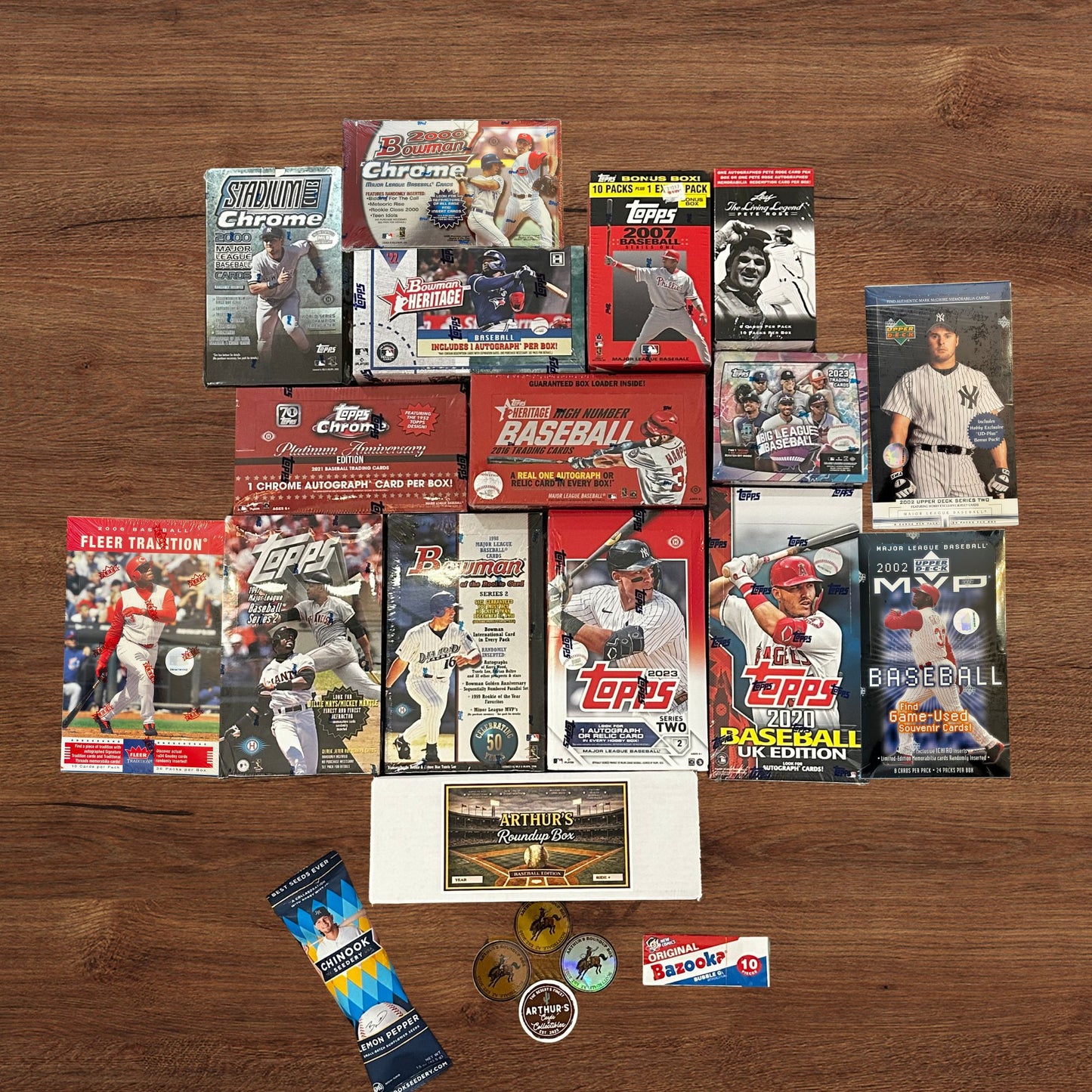 Collection of baseball trading cards on a wooden surface