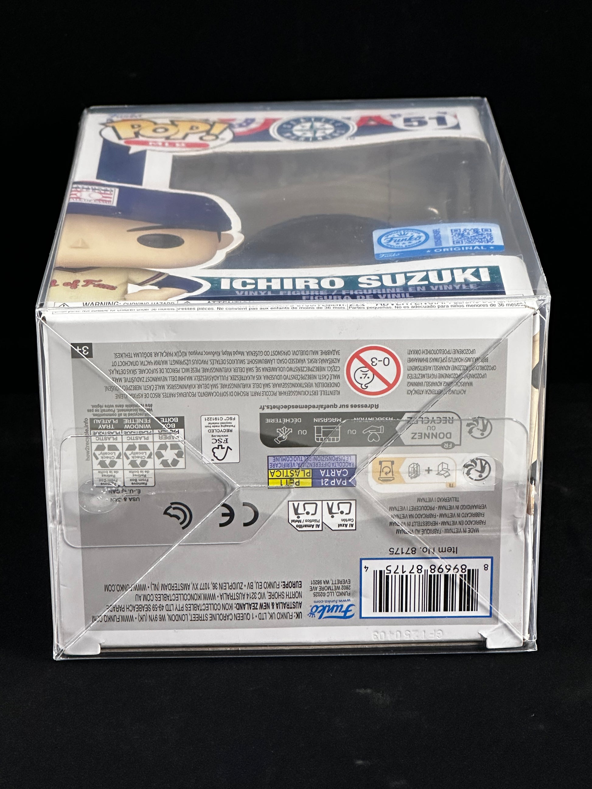 A Funko Pop! vinyl figure in its original clear plastic display box, showing the back of the packaging with product details, barcodes, and safety labels. The figure is Ichiro Suzuki, number 61 in the Pop! Heroes series.