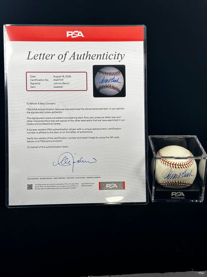 A PSA-authenticated baseball displayed in a clear acrylic case next to its Letter of Authenticity card, photographed against a dark background.