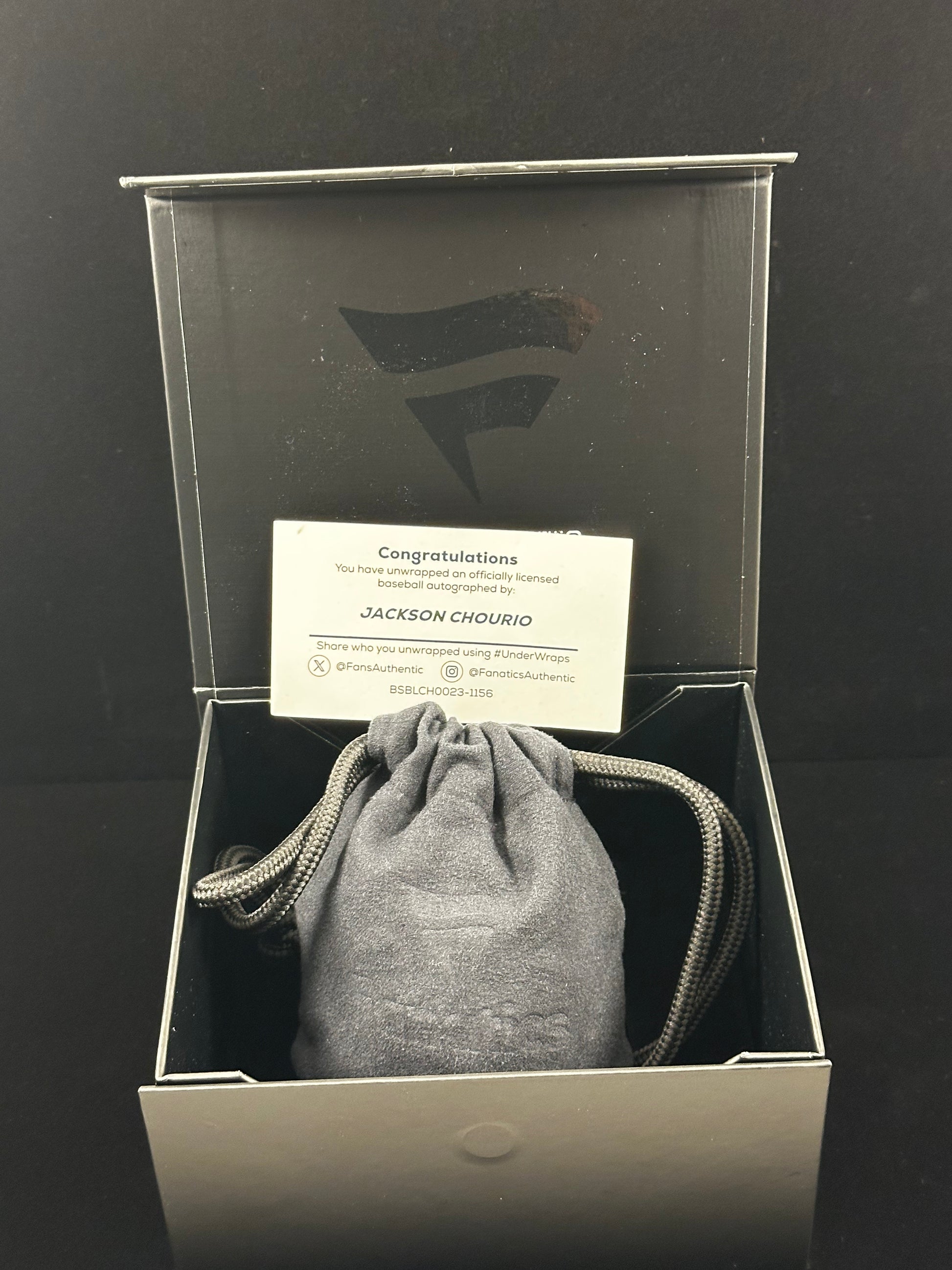 Fanatics Under Wraps box with bagged Jackson Chourio Auto and congratulations authentication certificate