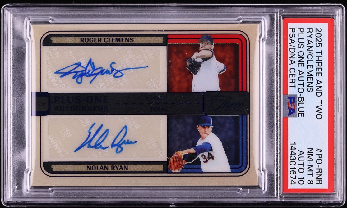 A PSA-graded 2025 trading card featuring Roger Clemens and Nolan Ryan, sealed in a clear plastic protective case. The card is a Plus-One Autograph edition with blue ink signatures and player photos on a red, black, and beige background.