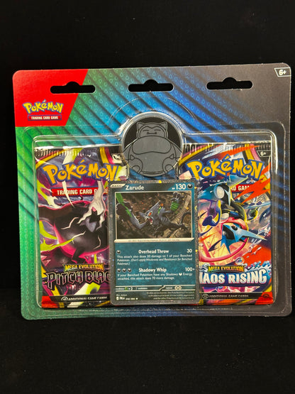 Pokémon Trading Card Game Mega Evolution Starter pack in its original blister packaging, featuring the Pokémon logo and cards including Zarude and a silver Snorlax collectible coin.
