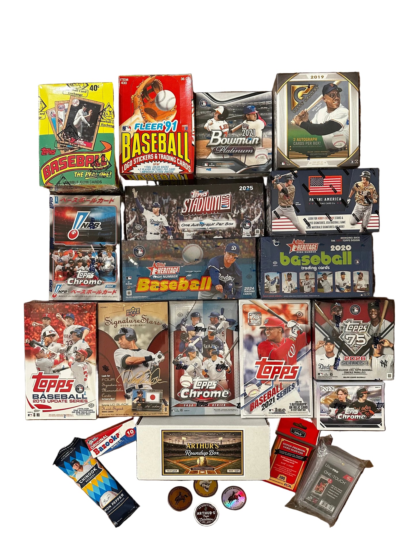 Collection of baseball trading card packs and boxes on a wooden surface