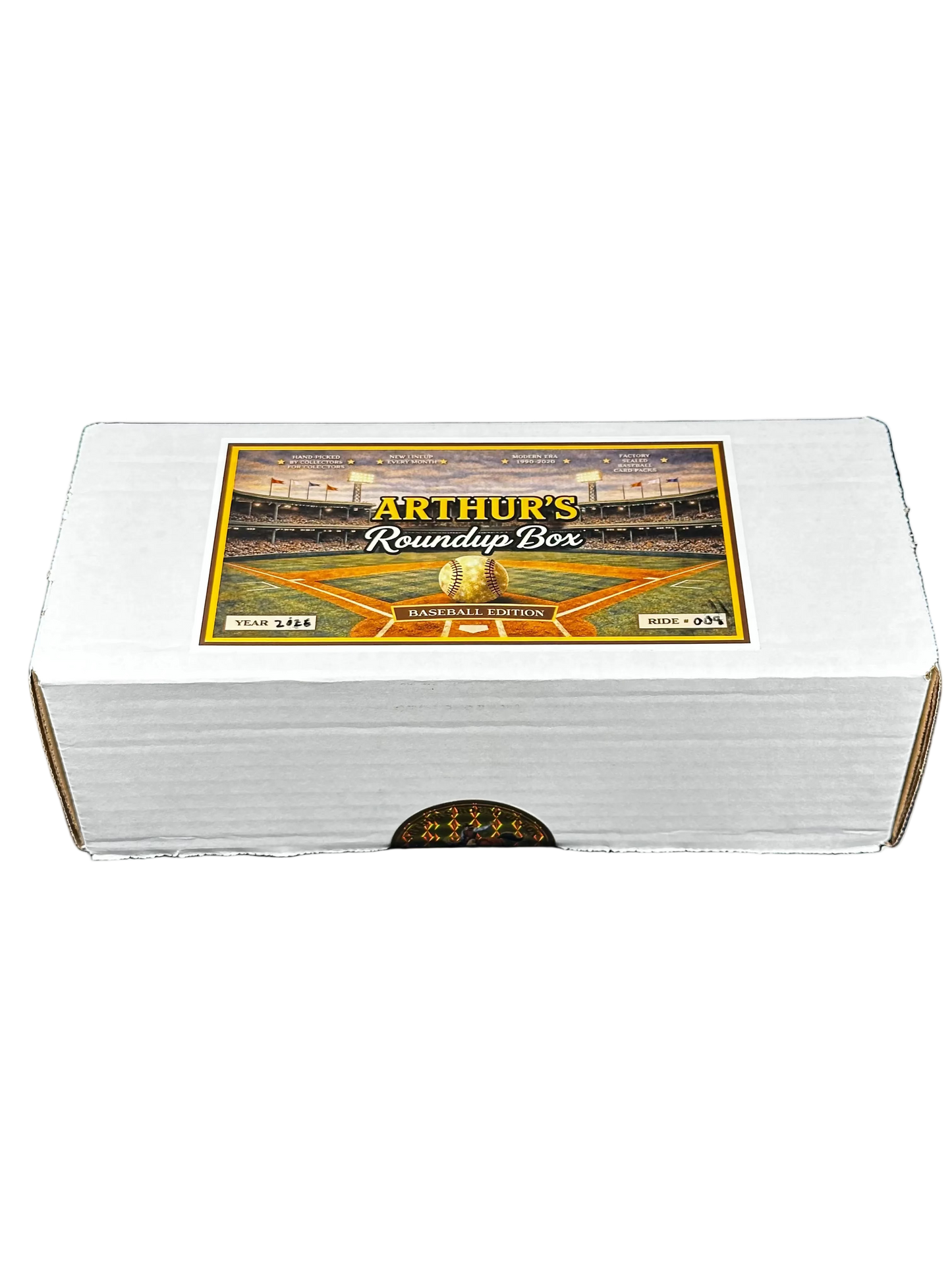 A white cardboard box labeled 'Arthur's Roundup Box' with a baseball stadium graphic on the lid, photographed against a black background.