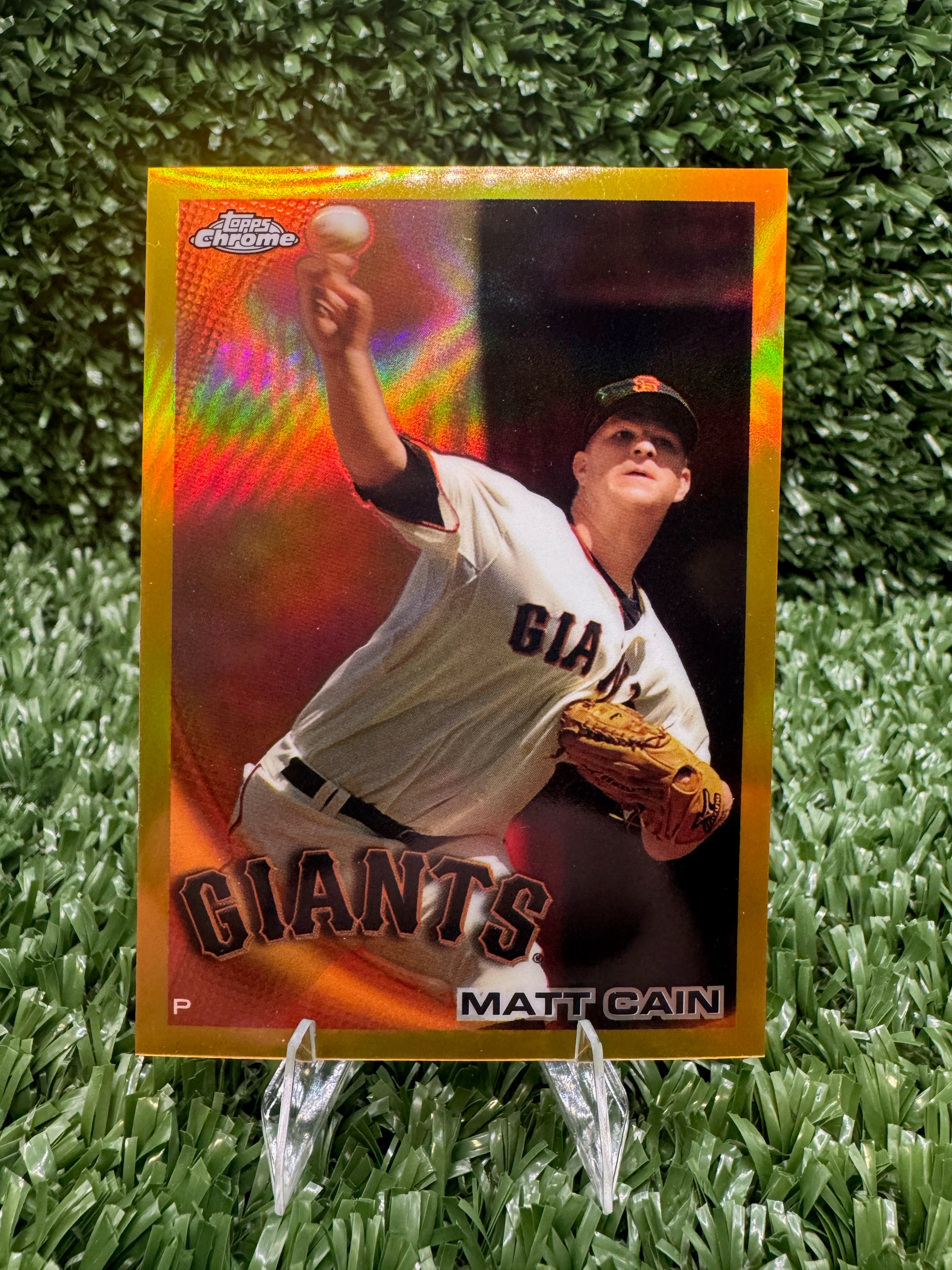 Baseball trading card of a player in a Giants uniform on grass