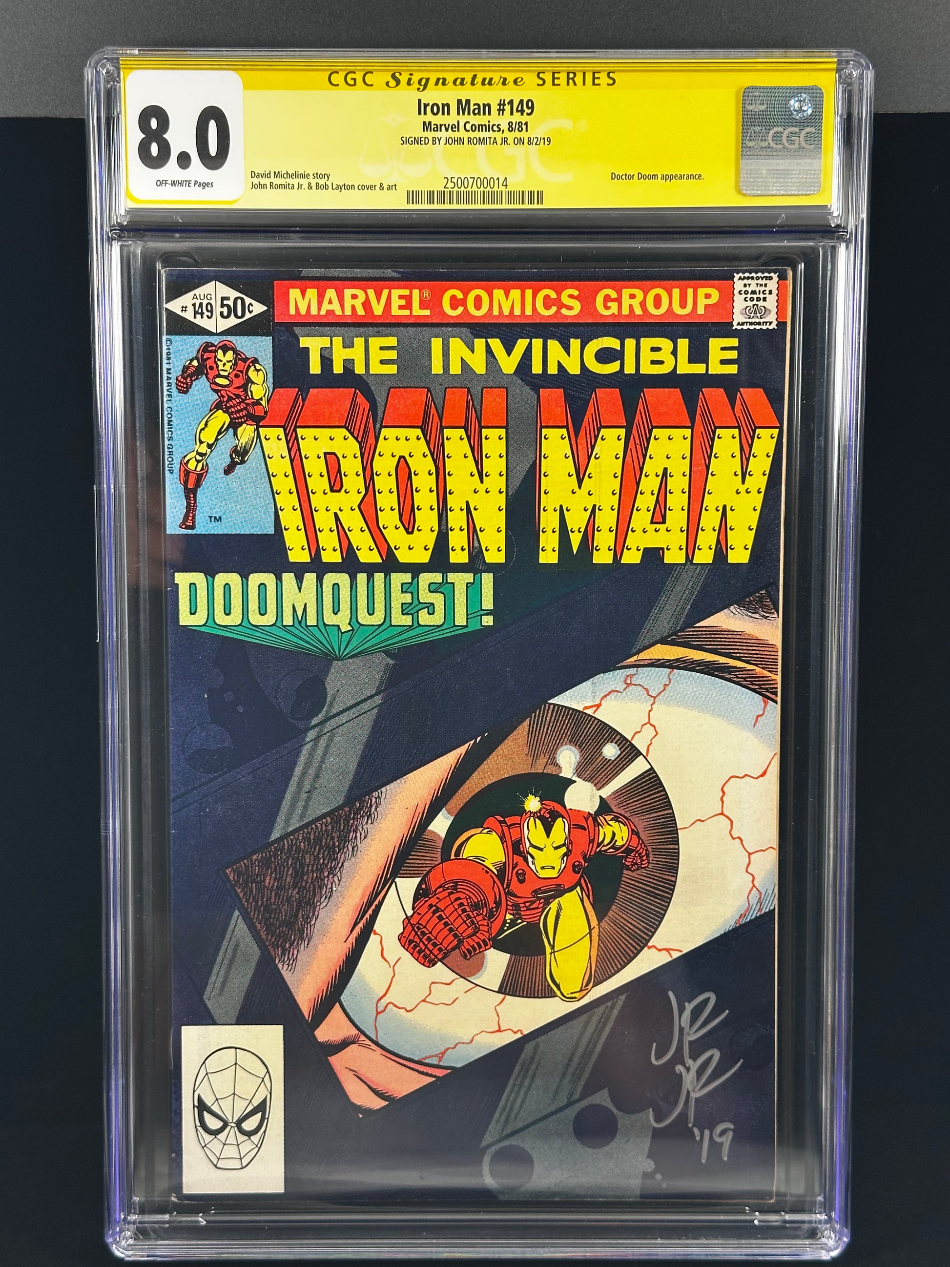 A CGC Signature Series graded Iron Man #149 comic book signed by John Romita Jr. from Marvel Comics Group, featuring a yellow top holder with an 8.0 grade and a black background.
